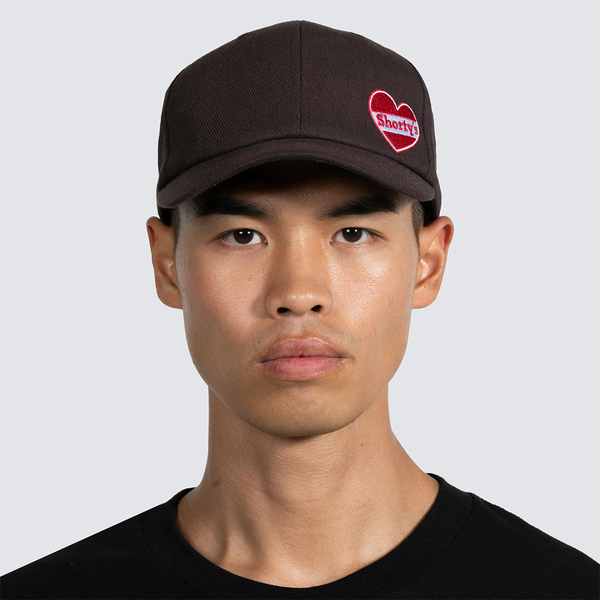 PLEASURES - HEART SNAPBACK BROWN