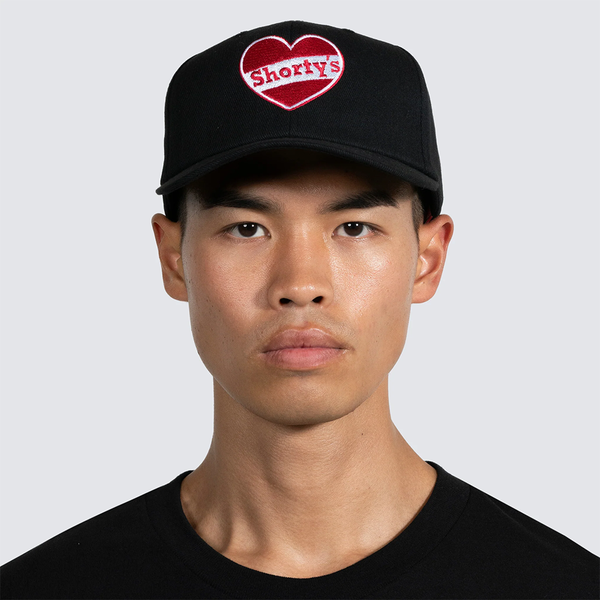 PLEASURES - HEART SNAPBACK BLACK